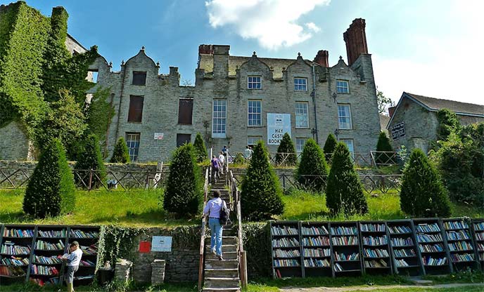 Hay-on-Wye castle with bookshelves outside