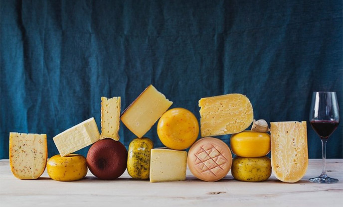 A display of a variety of cheeses 