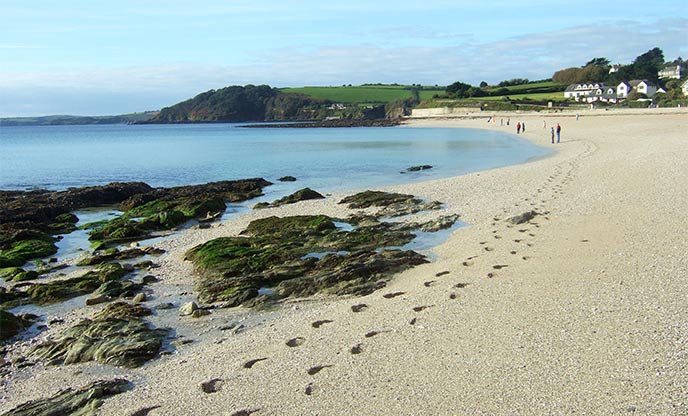 Calm sea and white sand at Gyllyngvase Beach, Cornwall