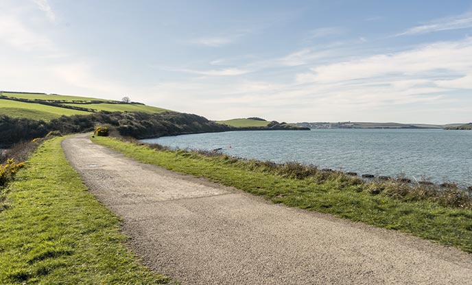 A flat path running alongside the Camel Estuary in Cornwall