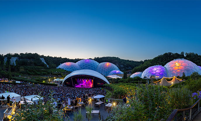 Colourful biomes illuminated at the Eden Project as crowd gathers for the Eden Sessions 
