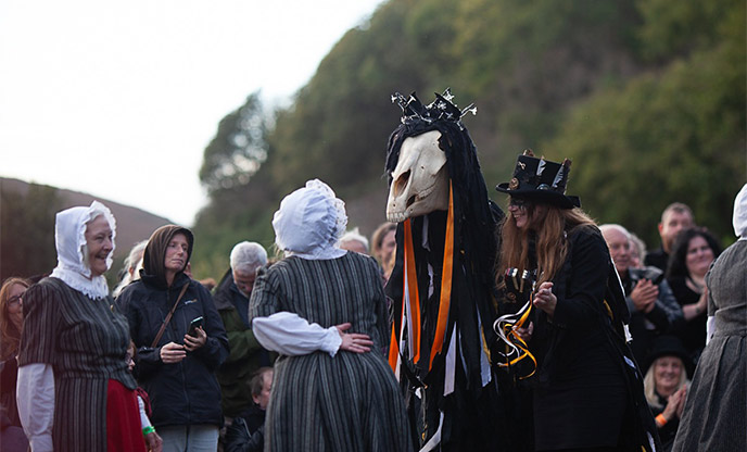 Group of people gathered in Cornwall for folklore Halloween Event