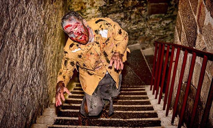 Zombie actor covered in blood at the Zombie Walk in St Austell