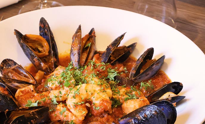 A plates of mussels and prawns at The Cellar Door restaurant in Durham