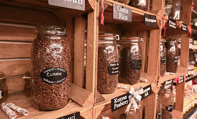 Shelves with jars full of coffee beans