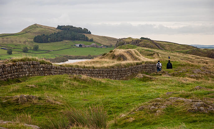 Walking alongside the remains of Hadrian's Wall.