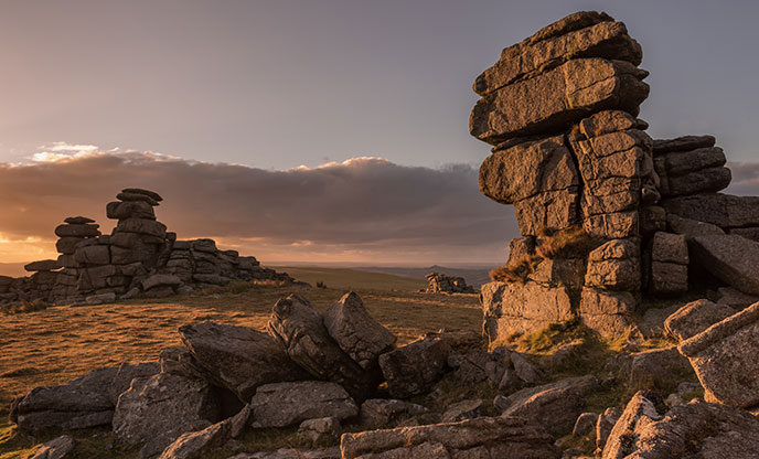 Sun set over the rocky towers of Great Staple Tor