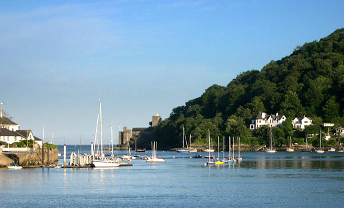 The mouth of the River Dart. Sugary Cove can be found just along the coastline following the coast path.