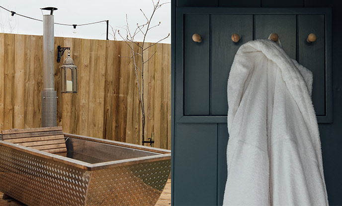 Outdoor Swedish bathtub (Left) Fluffy white robe hanging up (right)