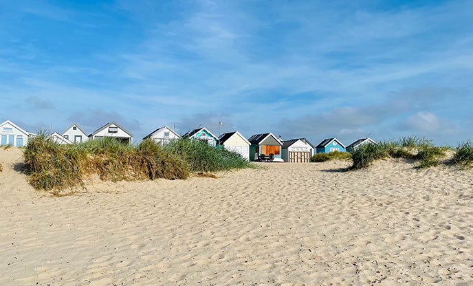 The brightly coloured beach huts at Mudeford in Dorset