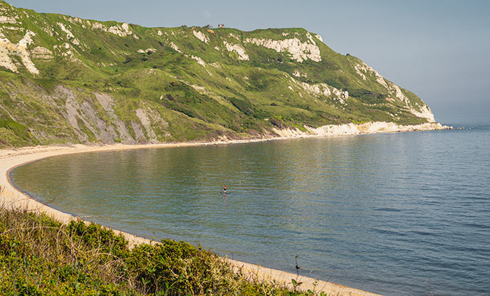 The gentle curve of Ringstead Bay in Dorset