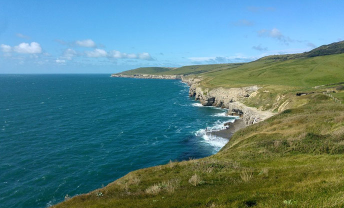 Looking down the coast at Purbeck in Dorset at Dancing Ledge, one of the great coastal walks in Dorset