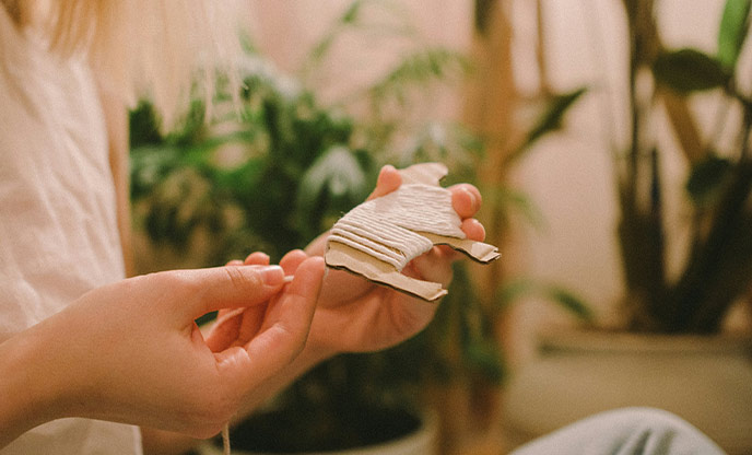 A close up of a person weaving 