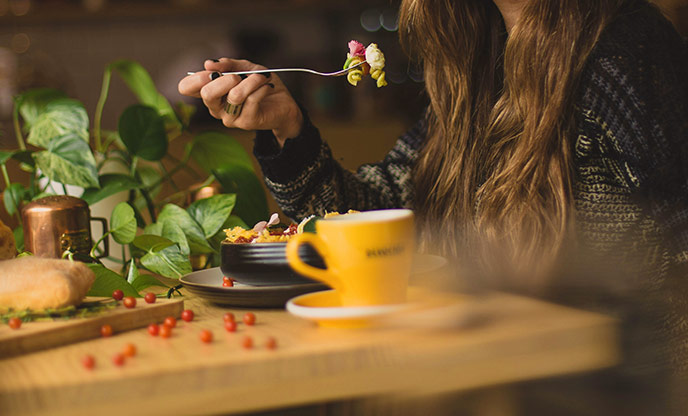 A person enjoying a delicious meal