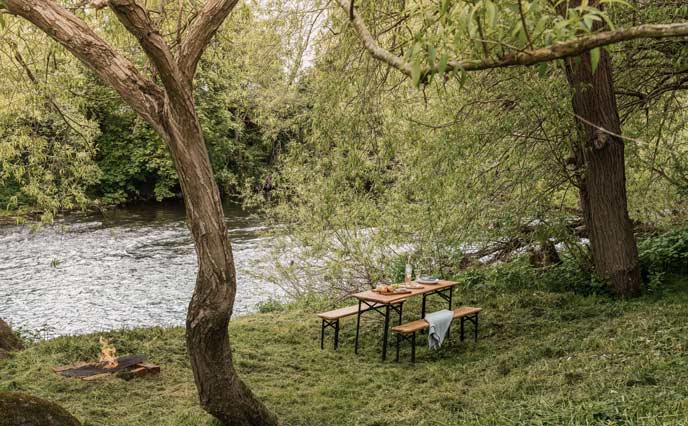 Dining by the river at River Safari in Herefordshire