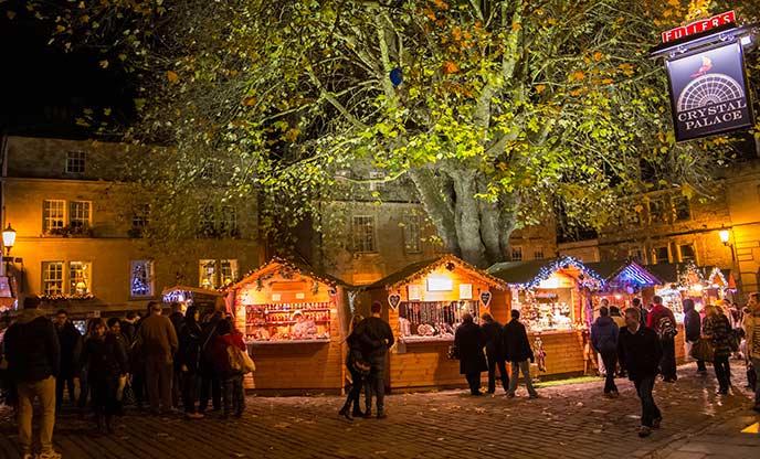 Bath Christmas markets at night with twinkling lights