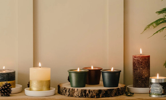 A display of festive candles by St.Eval