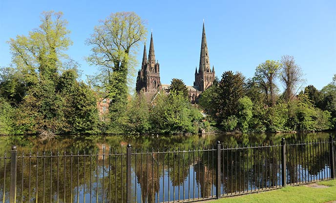 Pretty river and lush greenery surrounding Lichfield Cathedral