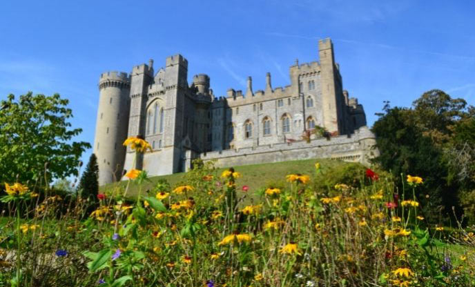 Arundel Castle with spring flowers and clear blue skies 