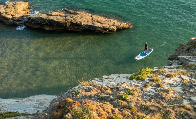 Stand up paddle boarding along the Helford River in Cornwall