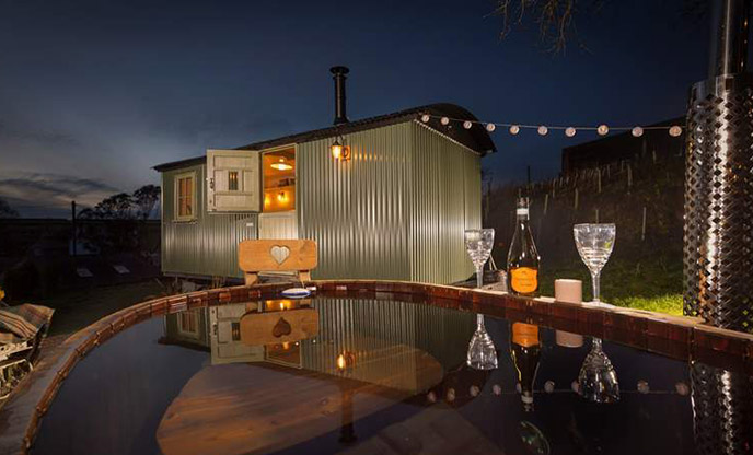 Sink into the romantic hot tub as dusk falls at our magical shepherd's hut in Devon.