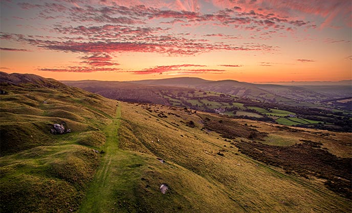 Golden and oranges hues over the Brecon Beacons as the sun sets