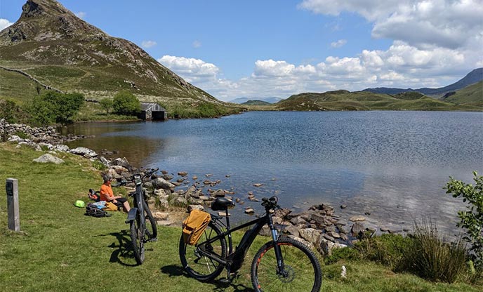 Stopping beside a lake in Snowdonia whilst cycling 