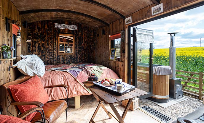 Interiors of upcycled railway carriage in the Yorkshire countryside 